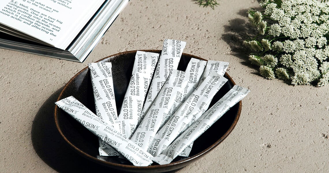 The Solution stick packs on a plate on a countertop 